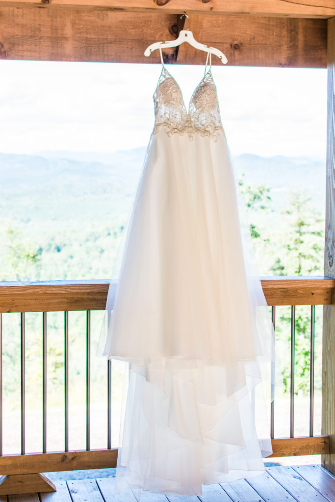 Beautiful chiffon dress with lace detailing for this bride's mountain-top elopement; David's Bridal; wedding dress; Asheville, NC elopement
