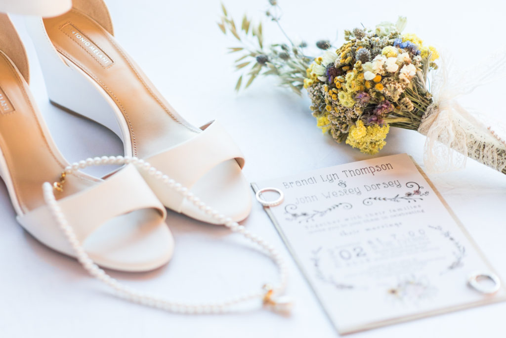 Bridal details; bouquet; necklace; invitation