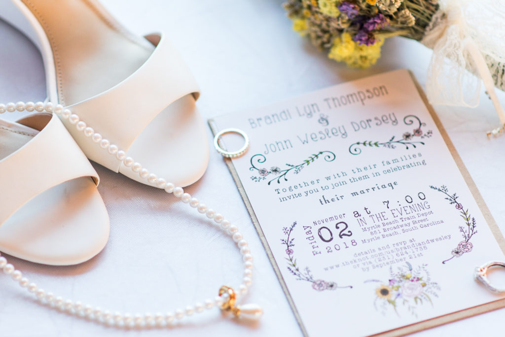 Bridal details; bouquet; necklace; invitation