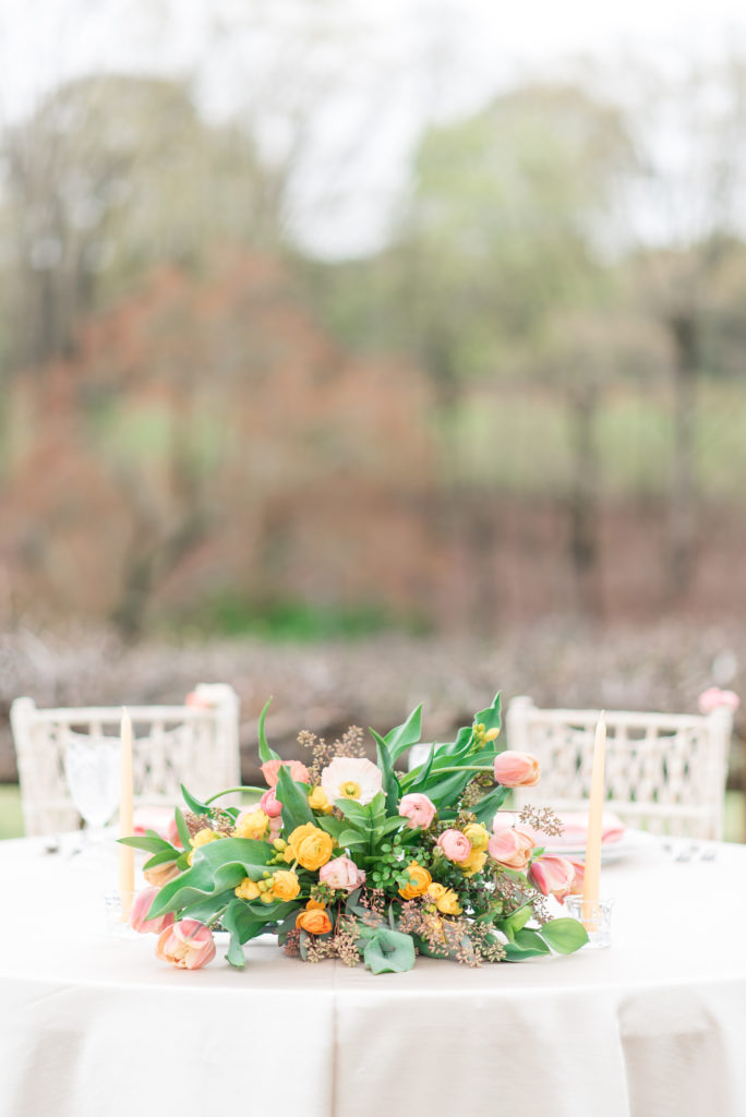 Charlotte floral designers at Simply Petals LLC create stunning spring arrangements with pops of yellow and coral