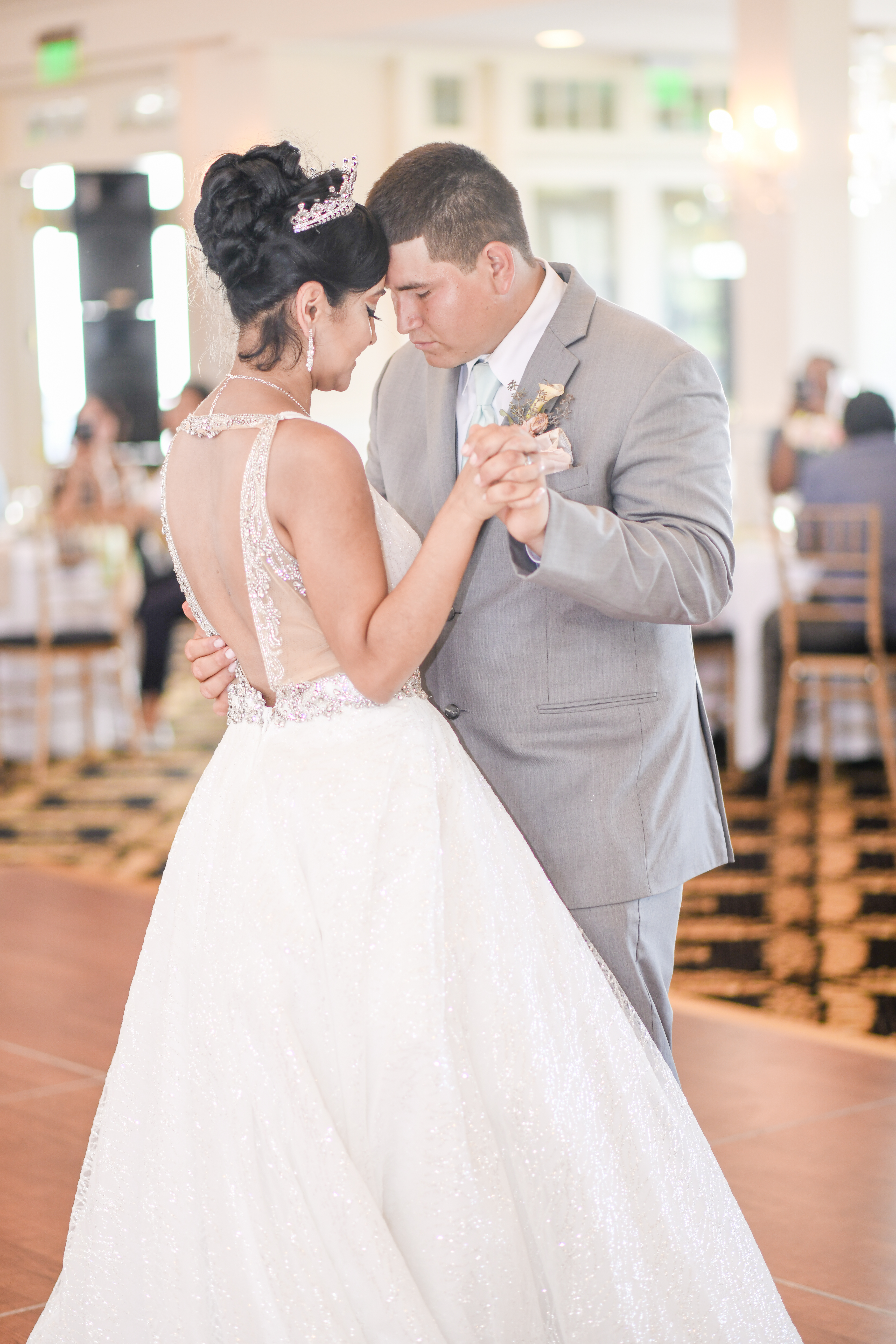 Couple share their first dance at their wedding