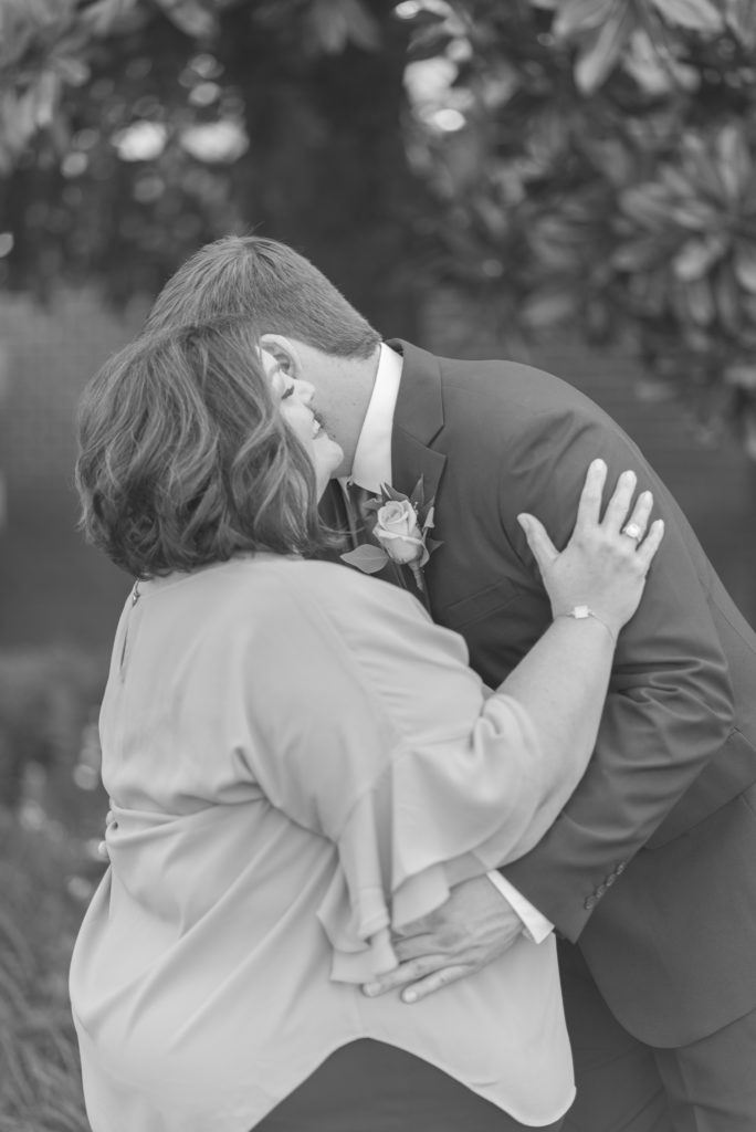 Roanoke Country Club Wedding; Mother of the groom and groom hug