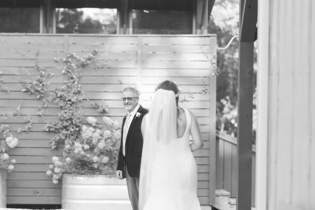 Bride and father of the bride share a first look moment