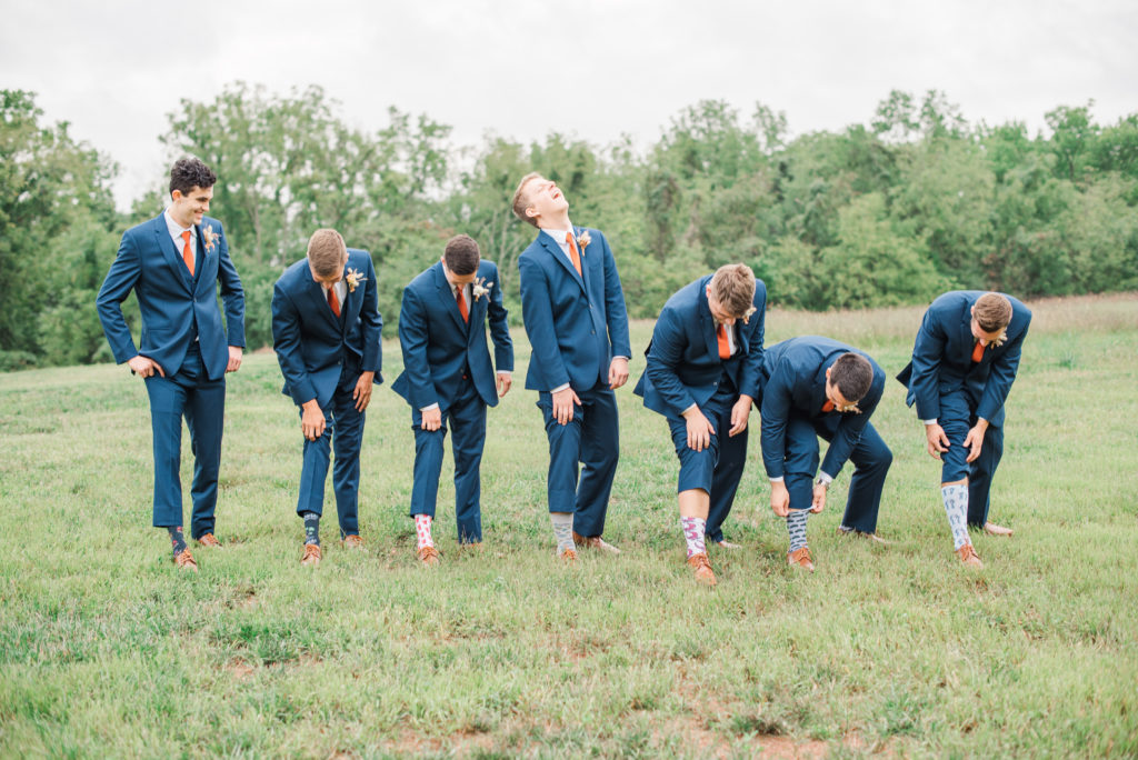 Groom and groomsmen show their crazy socks at Hazelwood Weddings