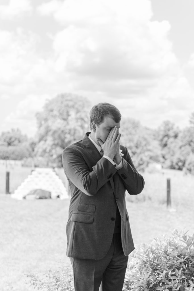 Groom reacts to seeing his bride at their first look