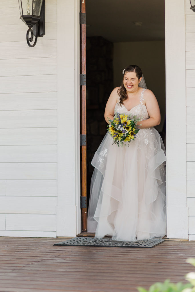 Bride reacts to seeing her groom at their first look