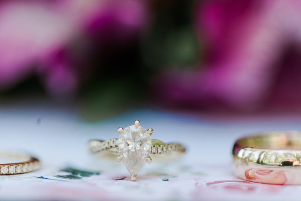 Bride and Groom rings and bridal details shot at a summer Splendor Pond wedding near Charlotte NC
