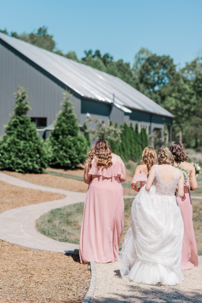 Bride and bridesmaids before Splendor Pond Wedding venue near Charlotte NC