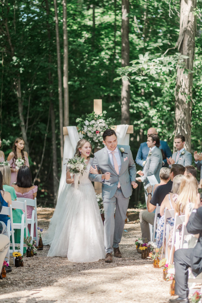 Summer wedding ceremony at Splendor Pond wedding venue near Charlotte NC