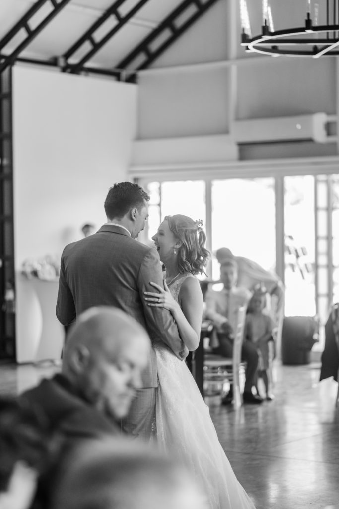 Bride and groom share their first dance at their wedding reception at Splendor Pond wedding