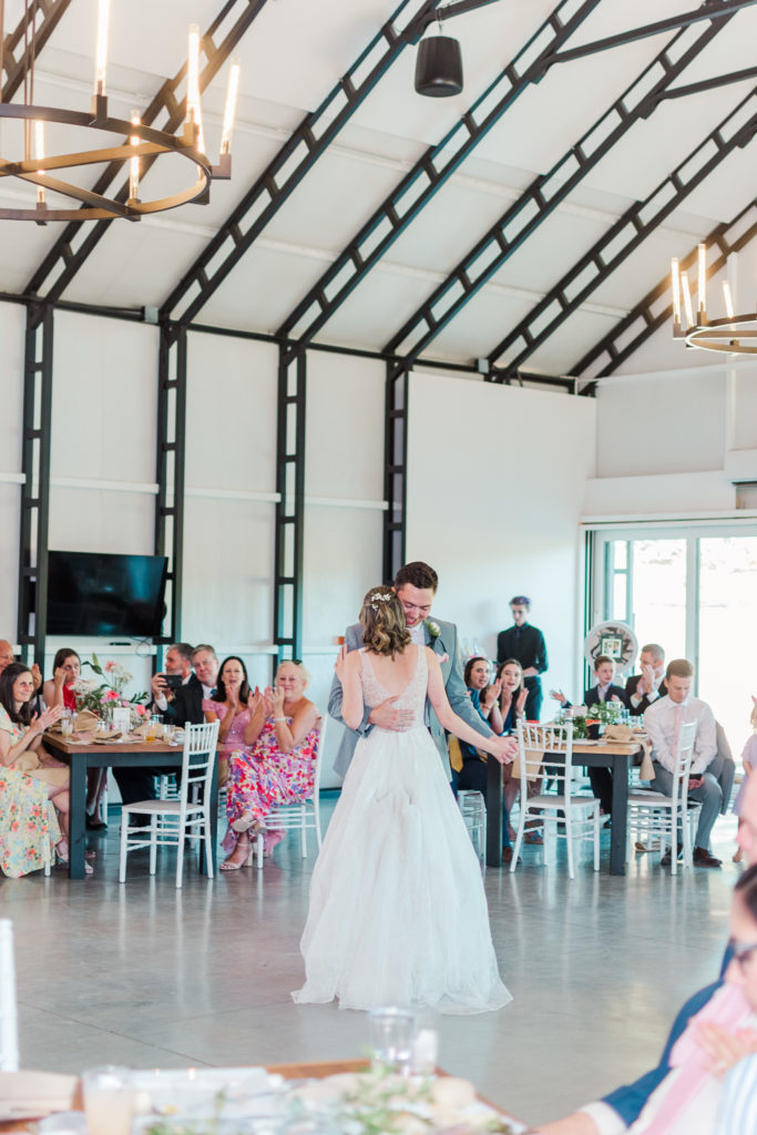 Bride and groom share their first dance at their wedding reception at Splendor Pond wedding